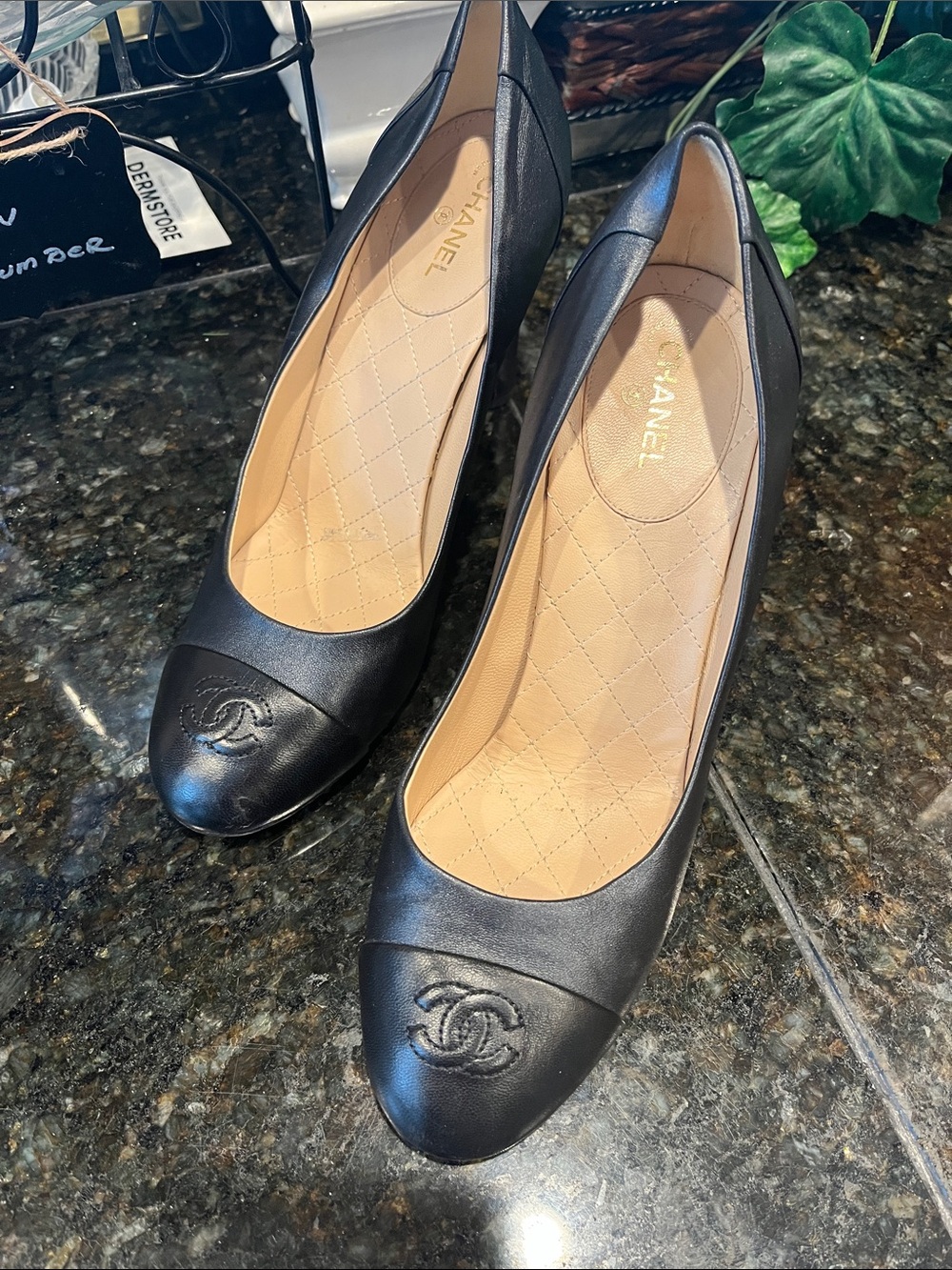 CHANEL Black Leather Cap-Toe Heels with Quilted Beige Insole